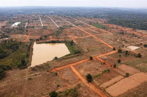 Farm land for sale easy drive with plotted layout roads and water body view